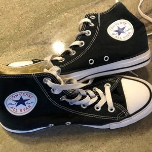 Ladies Black Converse shoes.